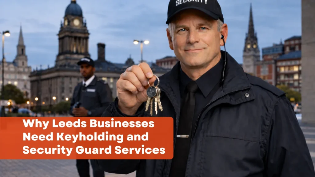 Security guard holding keys for keyholding service in Leeds city centre with Leeds Town Hall in the background